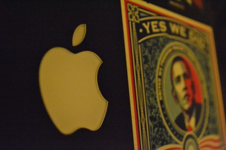 An Obama campaign decal next to the Apple logo on a user's laptop.