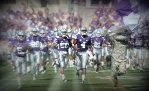 Wildcat Willie leads the Kansas State football team onto the field!