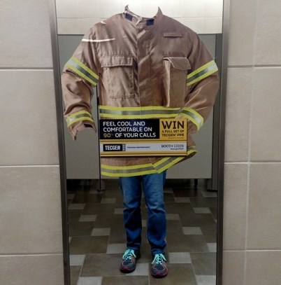 A turnout jacket cling on a bathroom mirror