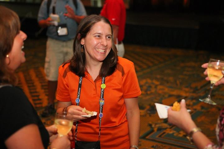 The author enjoying small talk at a conference.